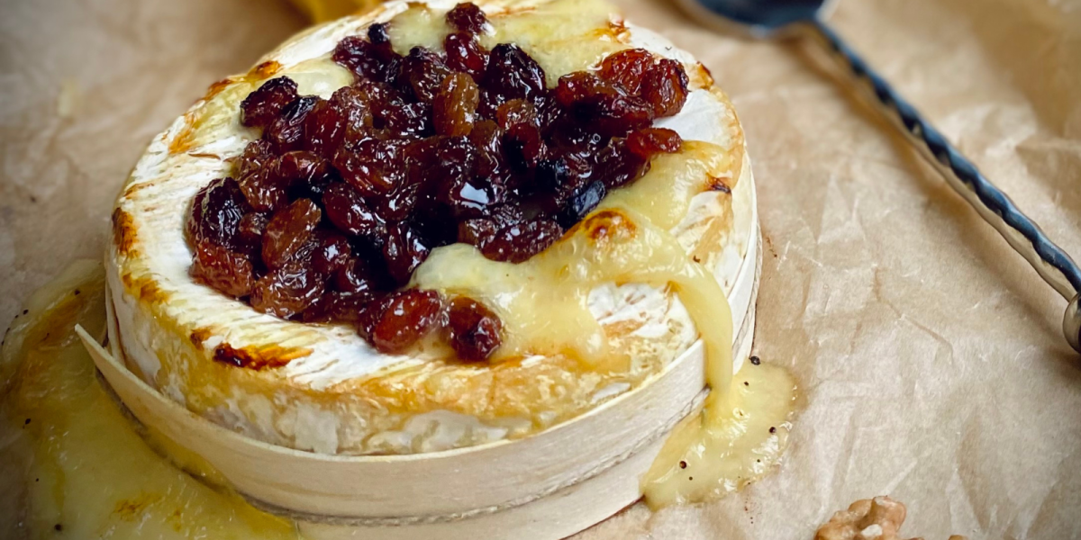Image of a baked Winslade with sultanas on top