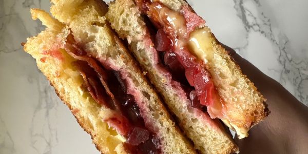 The image shows sourdough bread with Tunworth, Pancetta and Beetroot as a toastie